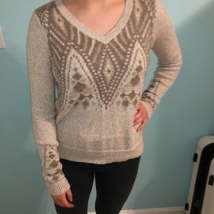Tan sweater with brown design